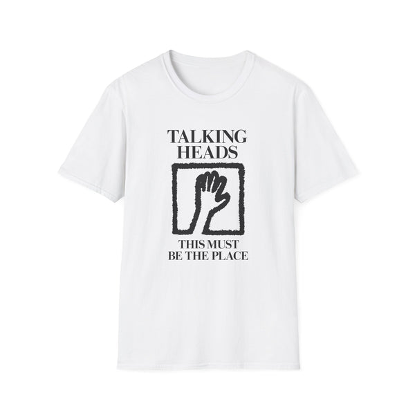 White t-shirt with "TALKING HEADS" and "THIS MUST BE THE PLACE" text and a hand graphic.