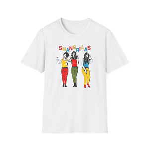 White t-shirt with "Shangri-Las" text and three cartoon women in colorful outfits.