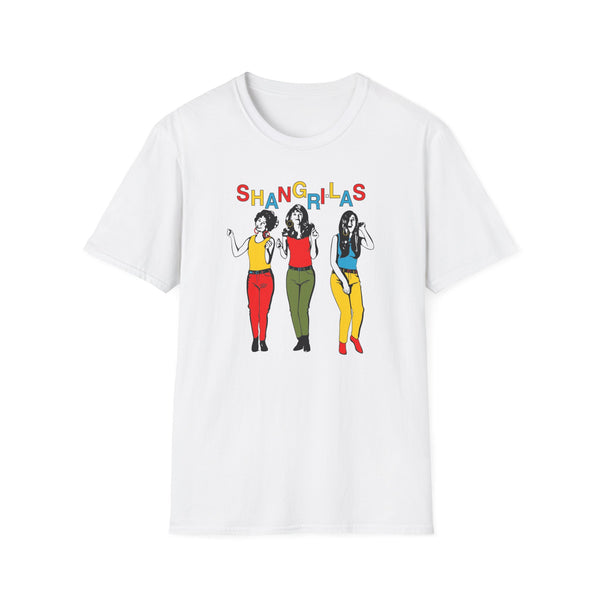 White t-shirt with "Shangri-Las" text and three cartoon women in colorful outfits.