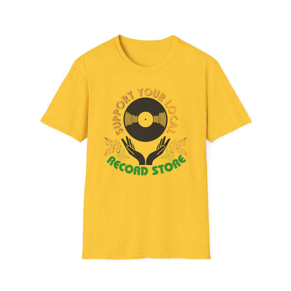 Yellow t-shirt with circular vinyl record graphic and text supporting local record stores.