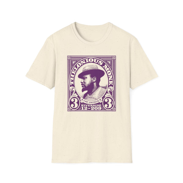 Cream t-shirt with a purple graphic of Thelonious Monk in a stamp design.