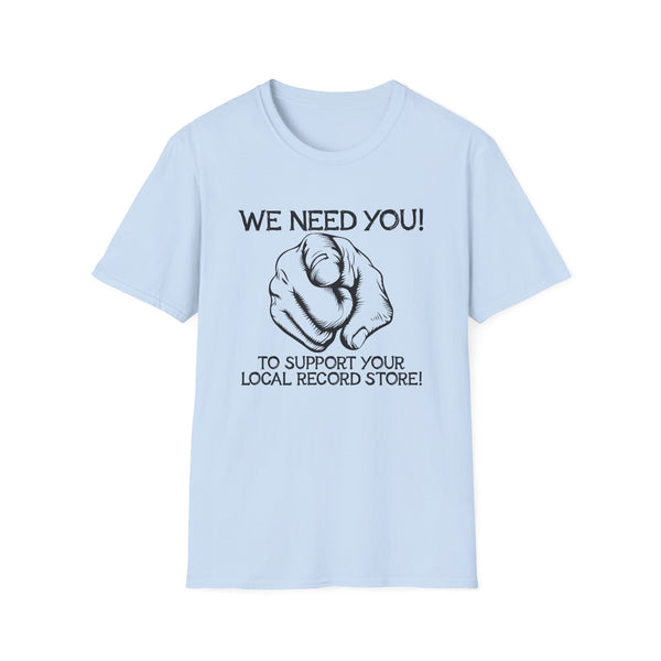 Light blue t-shirt with black text and a hand pointing: "We need you!"