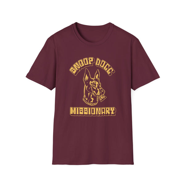 Maroon t-shirt with a Doberman wearing a chain and holding a condom, text says Missionary.