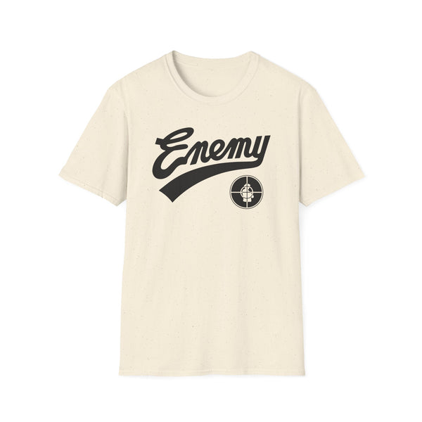 Cream t-shirt with black "Enemy" script and target logo on chest.