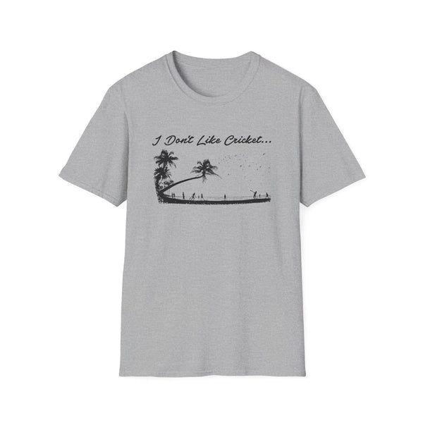 T-shirt with black graphic of palm trees and people playing cricket, text "I Don't Like Cricket...".