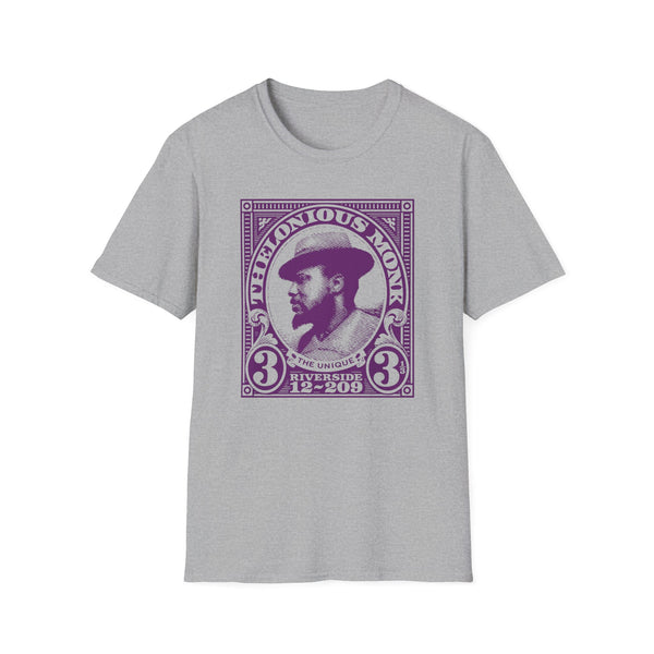 Thelonious Monk portrait stamp design with text on a grey t-shirt.